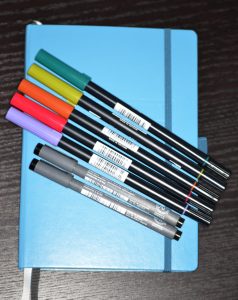 Bullet journal supplies for 2018 - an official Leuchturm Bullet journal and several different coloured pens